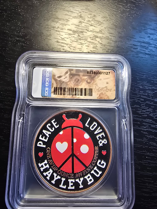PIRATE 1 oz Colorized Copper Round - PEACE LOVE & HAYLEYBUG - ICG Graded MS70